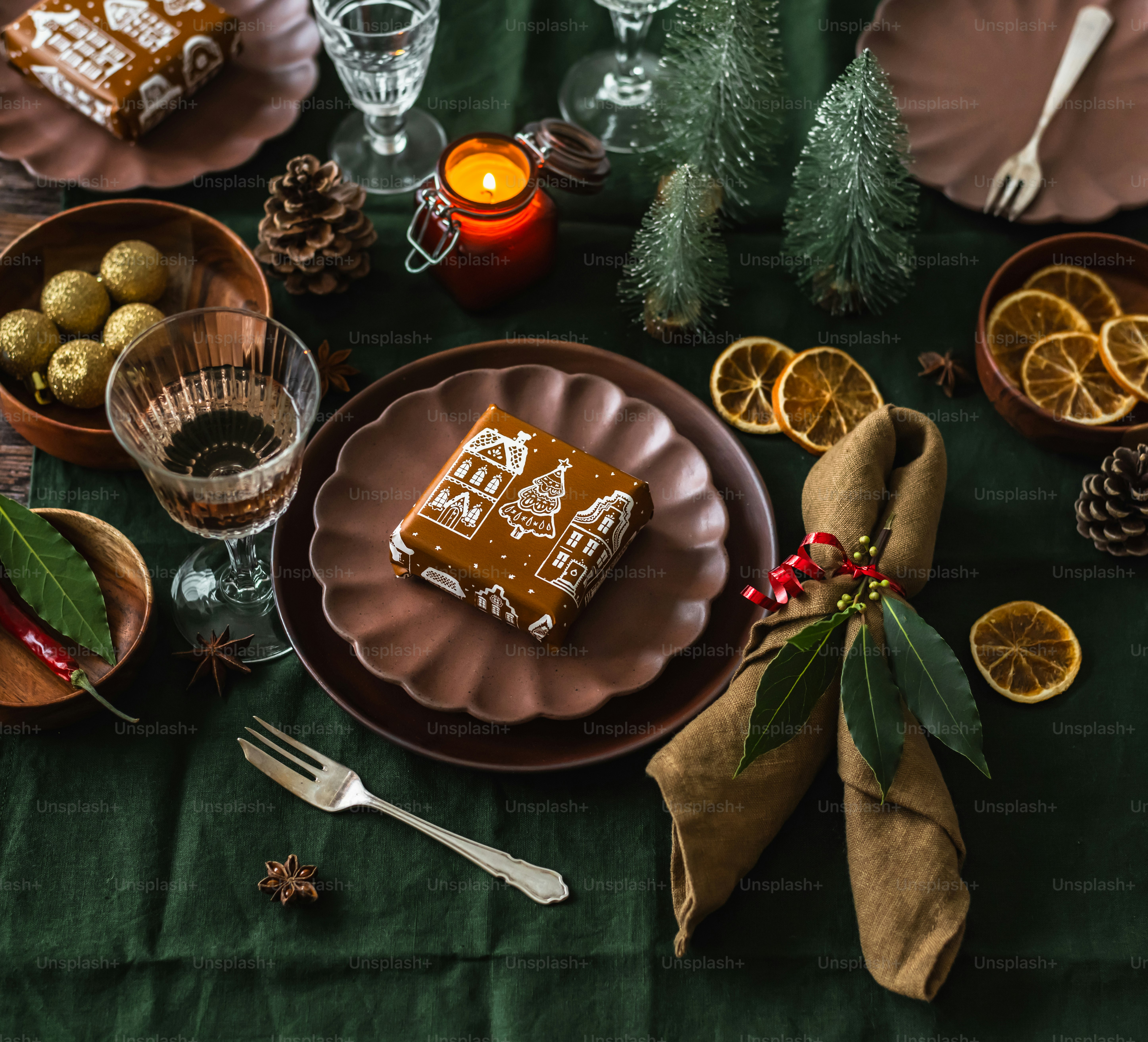a table topped with plates and bowls filled with food