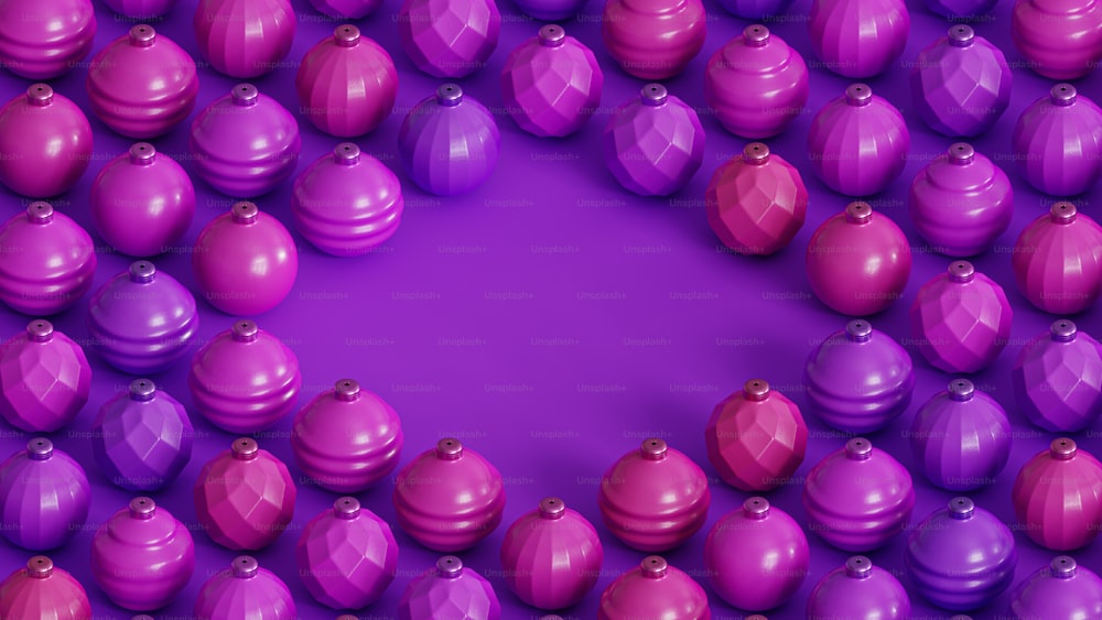 a large group of purple and pink ornaments