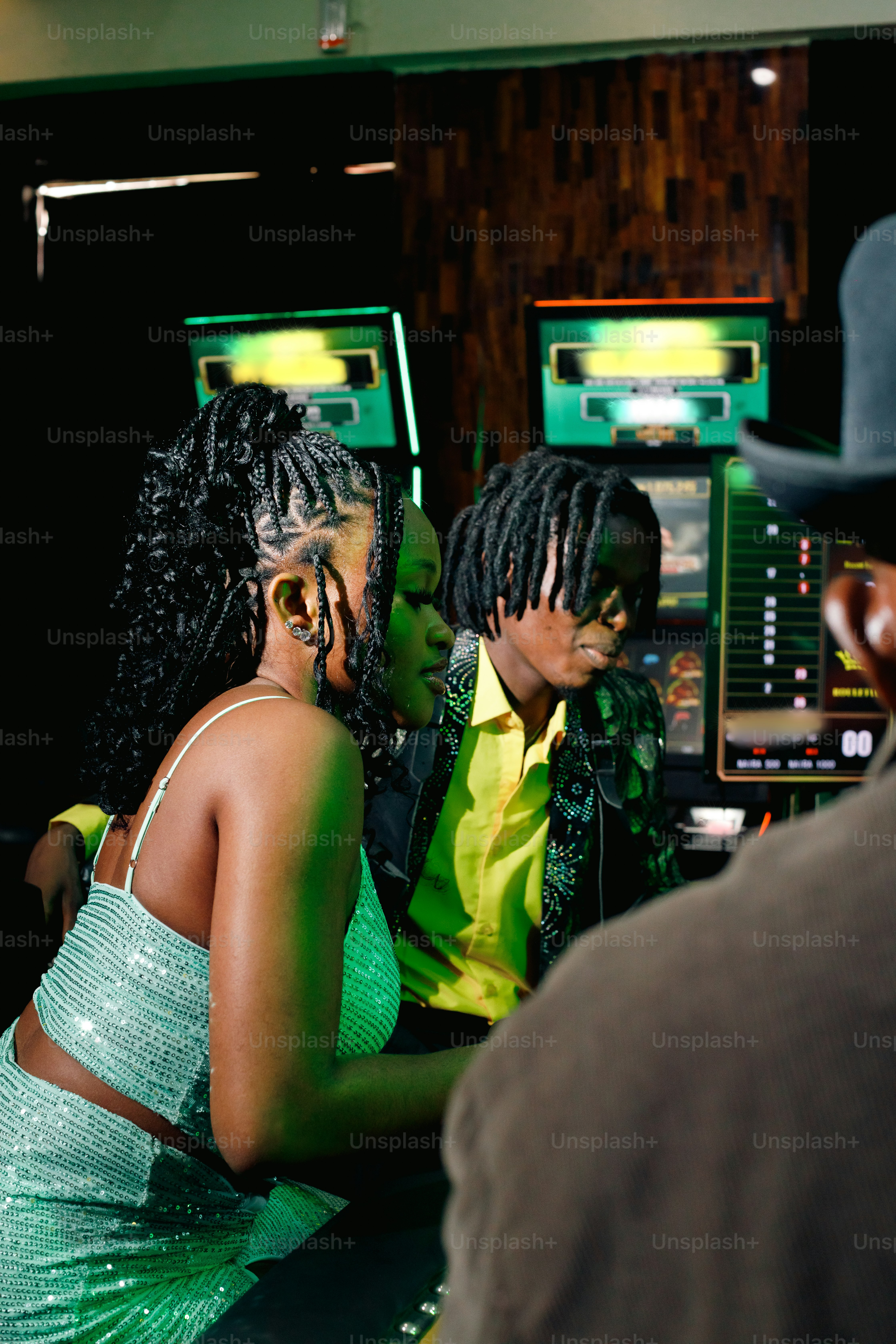 a couple of people that are sitting in front of a computer