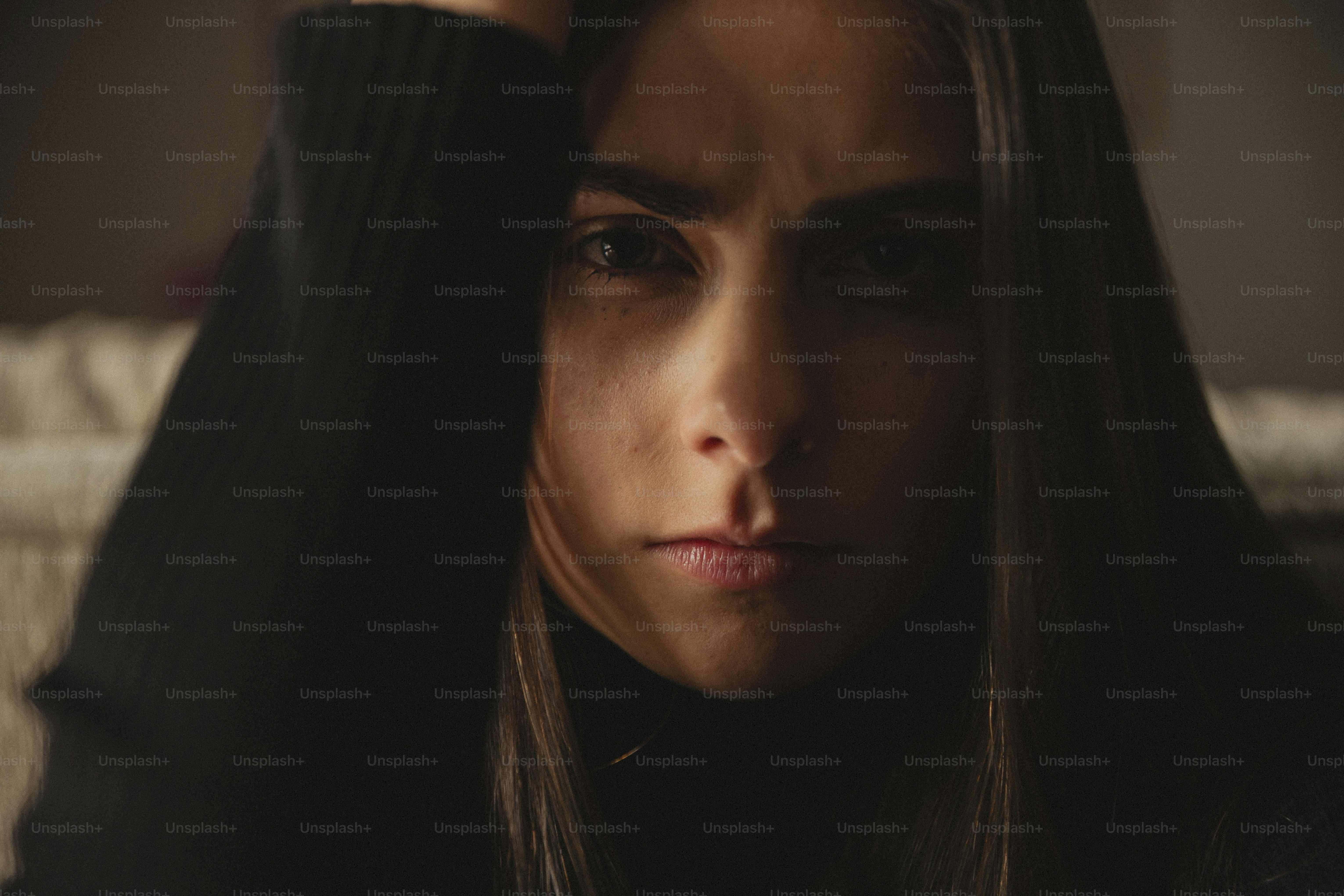 a woman with her hand on her head