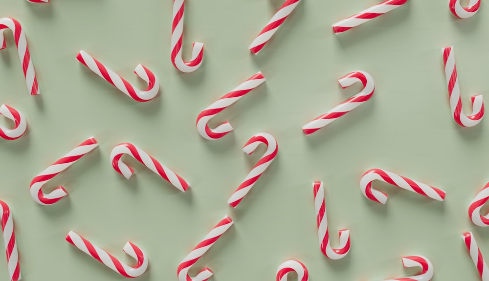 a group of candy canes laying on top of each other