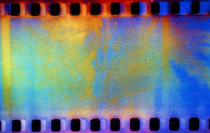 a close up of a film strip with a blurry background