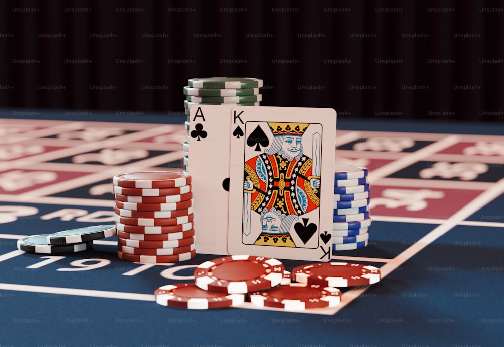 une table de casino avec des jetons de poker et des cartes à jouer