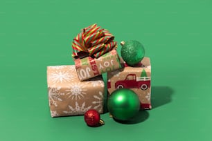 presents wrapped in brown paper with green and red ornaments