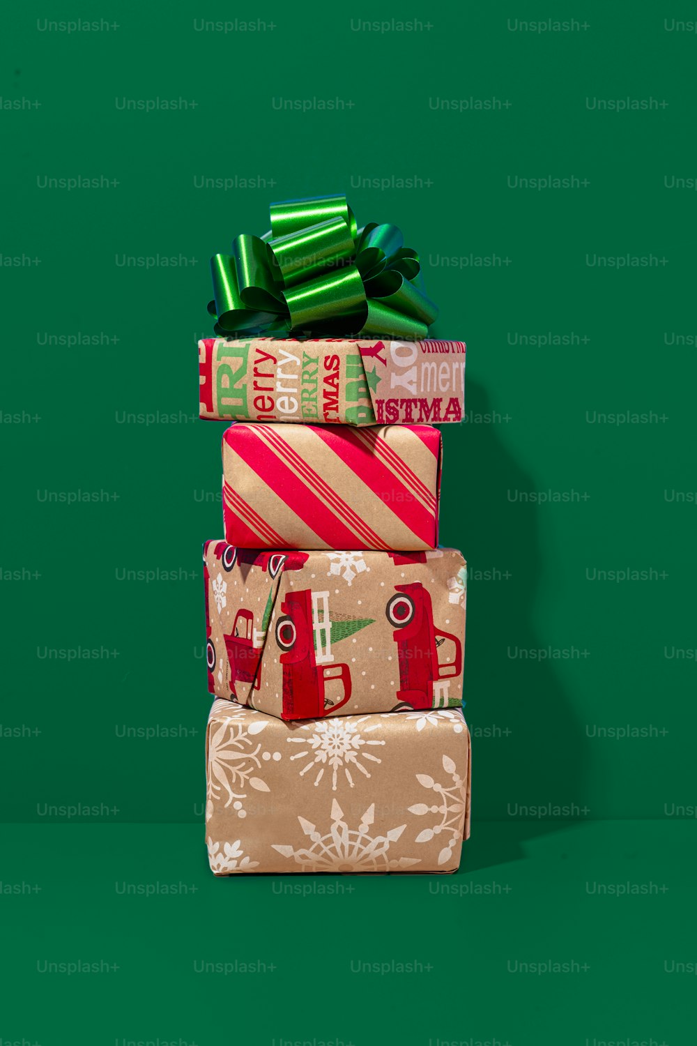 a stack of wrapped presents sitting on top of each other
