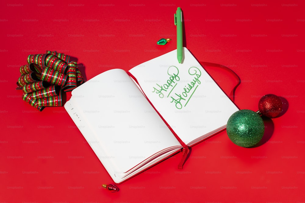 an open notebook with a christmas message on it