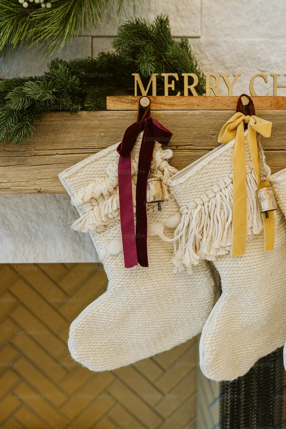 a christmas stocking hanging from a mantel