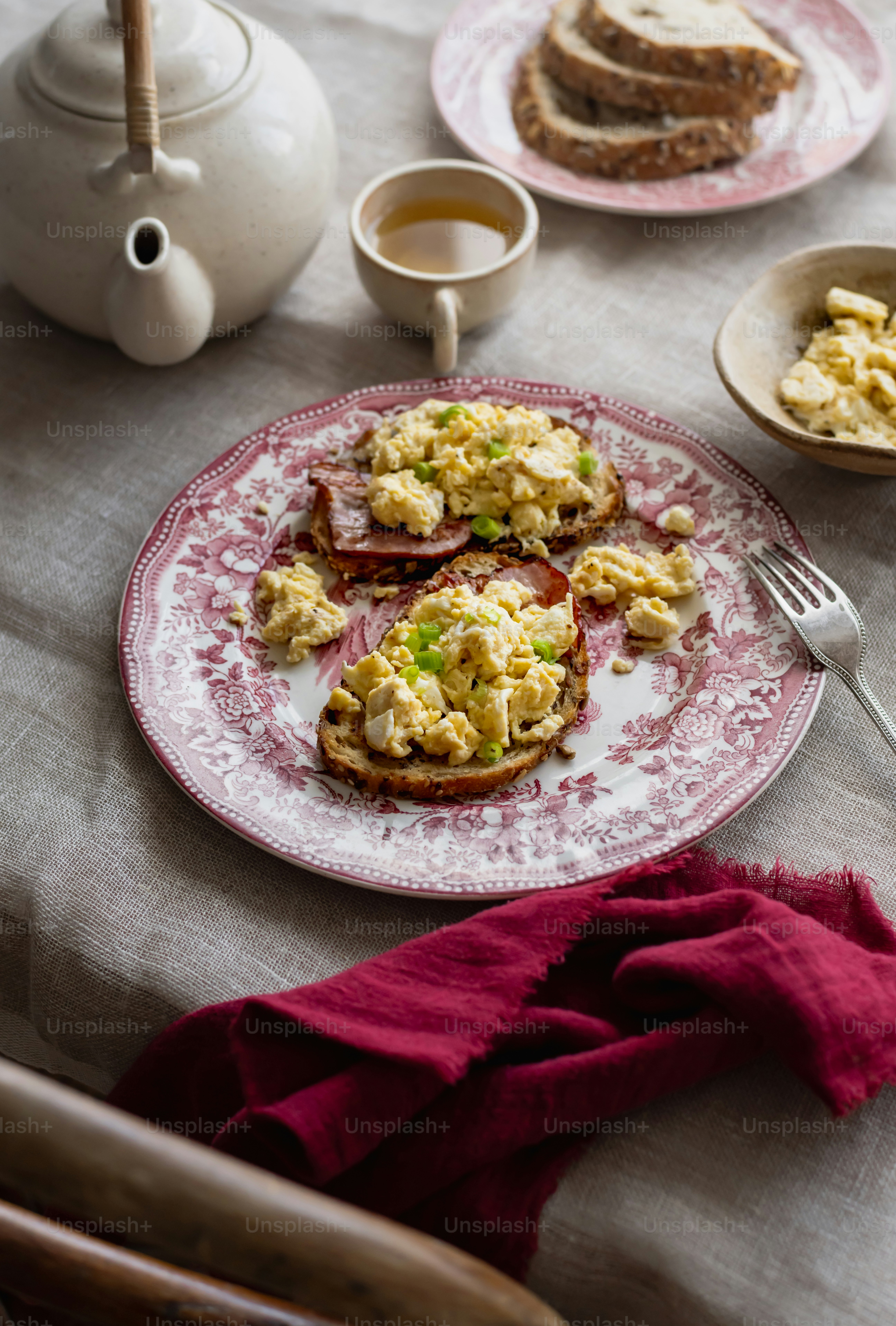 a plate of eggs and toast on a table