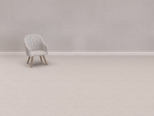 a white chair sitting on top of a white floor