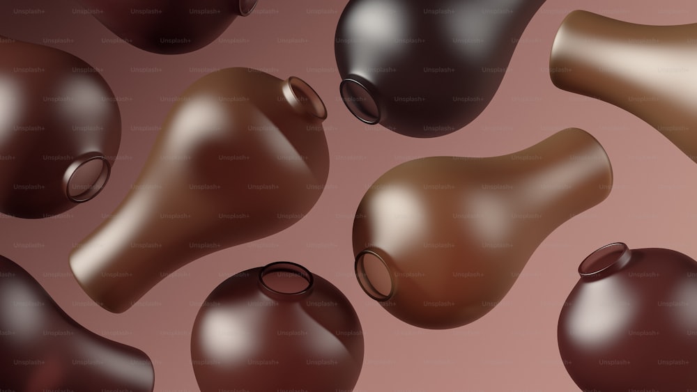 um grupo de chocolates em um fundo rosa