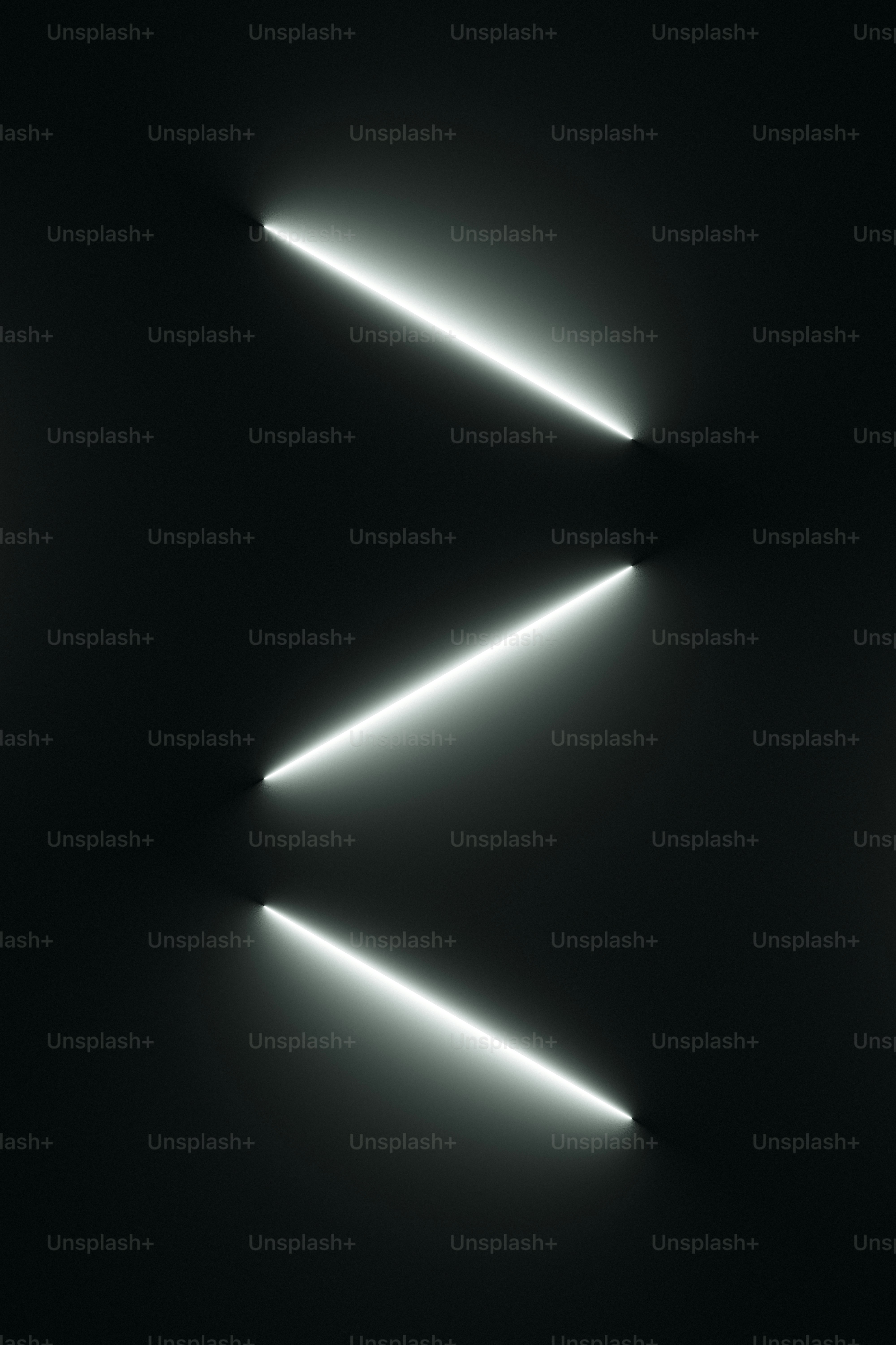 a black and white photo of a light in the dark