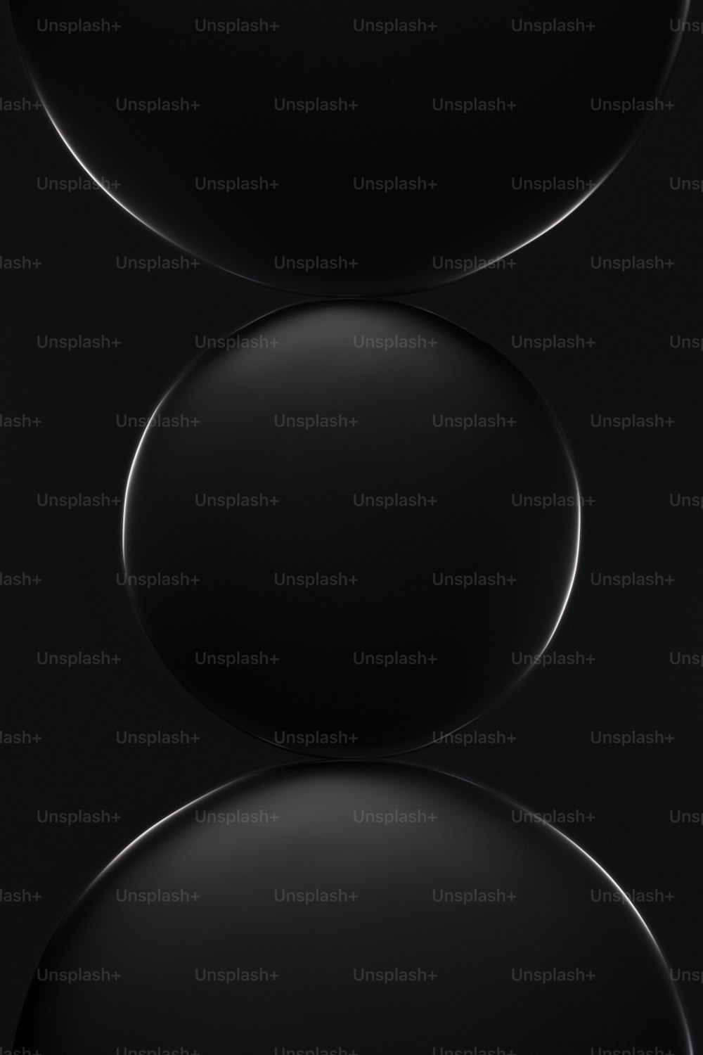 a black background with three circles in the middle