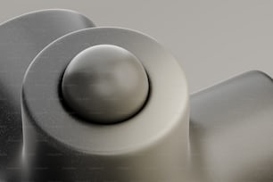 un primer plano de un objeto blanco con un fondo gris