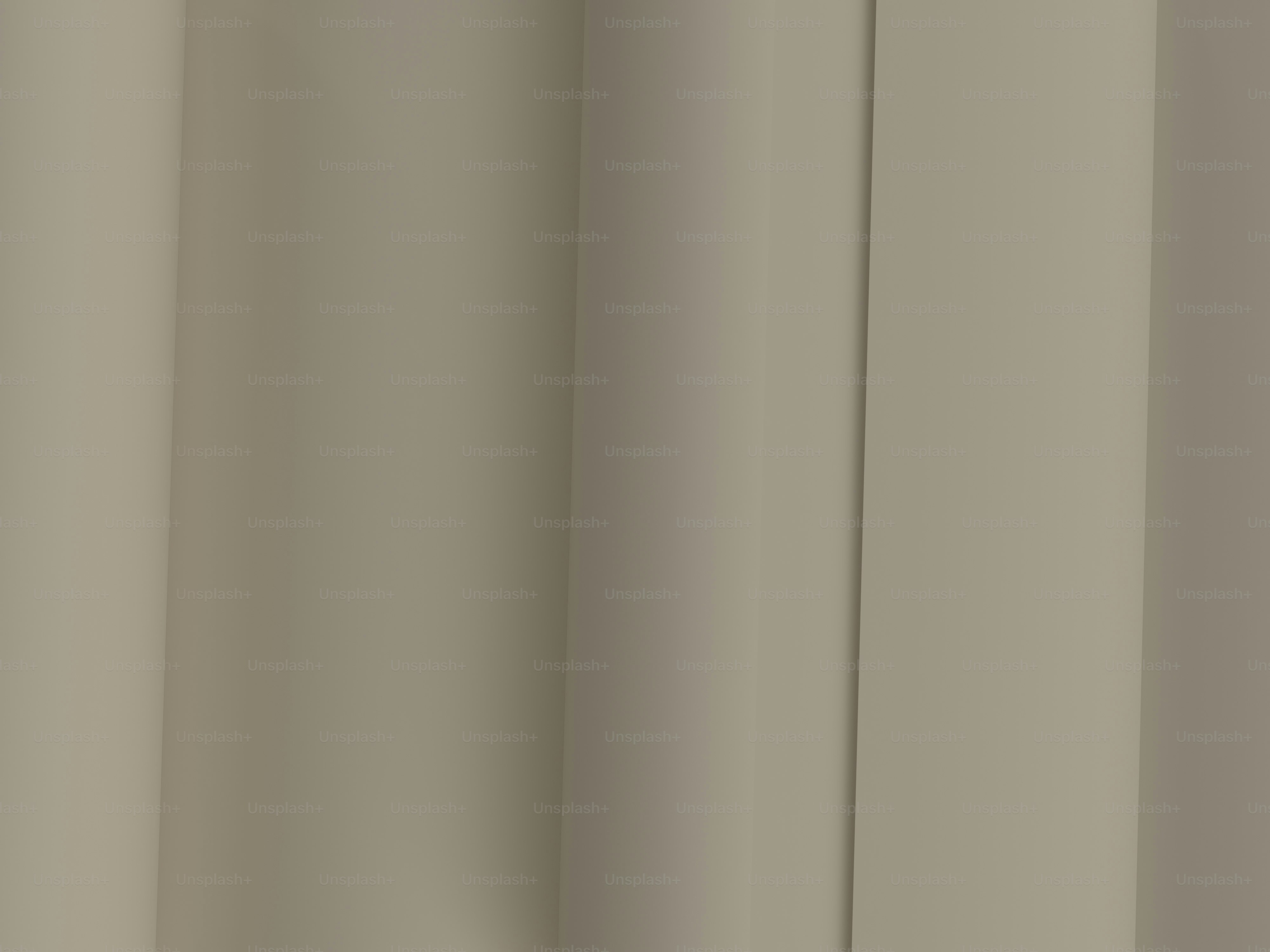 a close up of a curtain with a white background