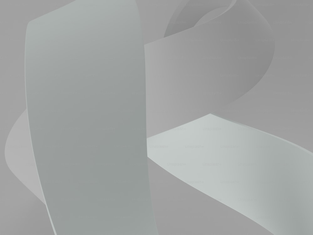 Ein grau-weißes Foto eines gekrümmten Objekts