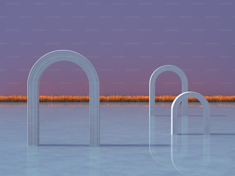 a group of white arches sitting in the middle of a body of water