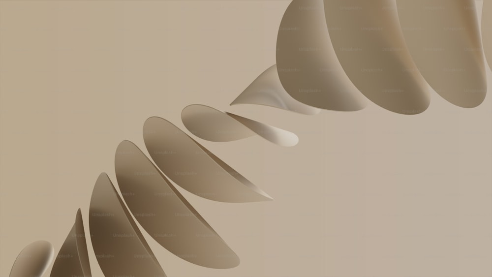 ein beigefarbener abstrakter Hintergrund mit geschwungenen Formen