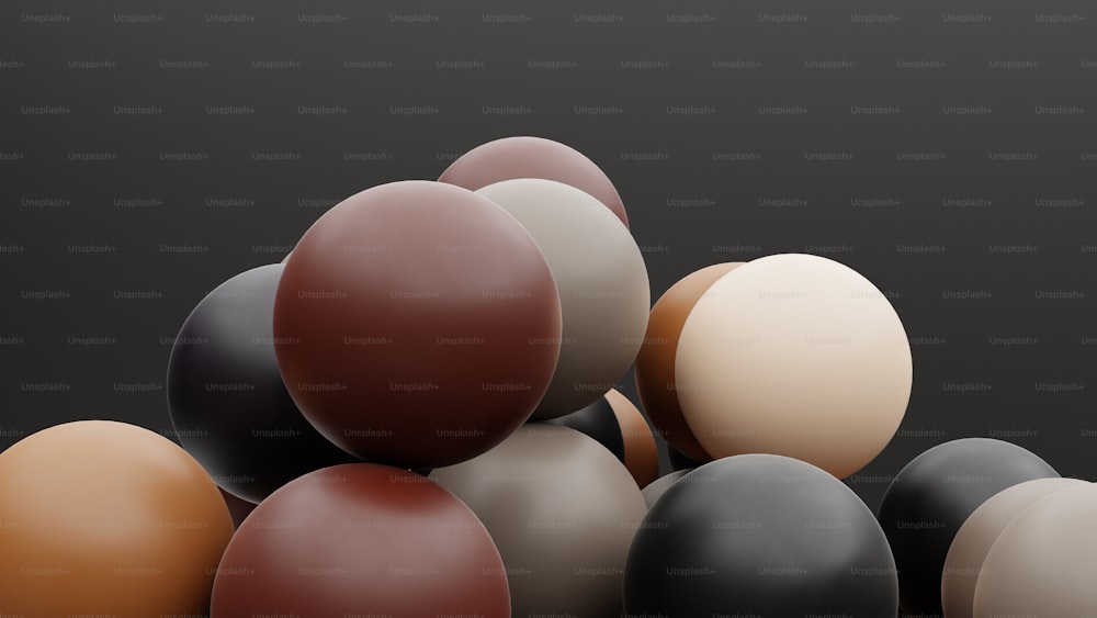 a bunch of different colored balls stacked on top of each other