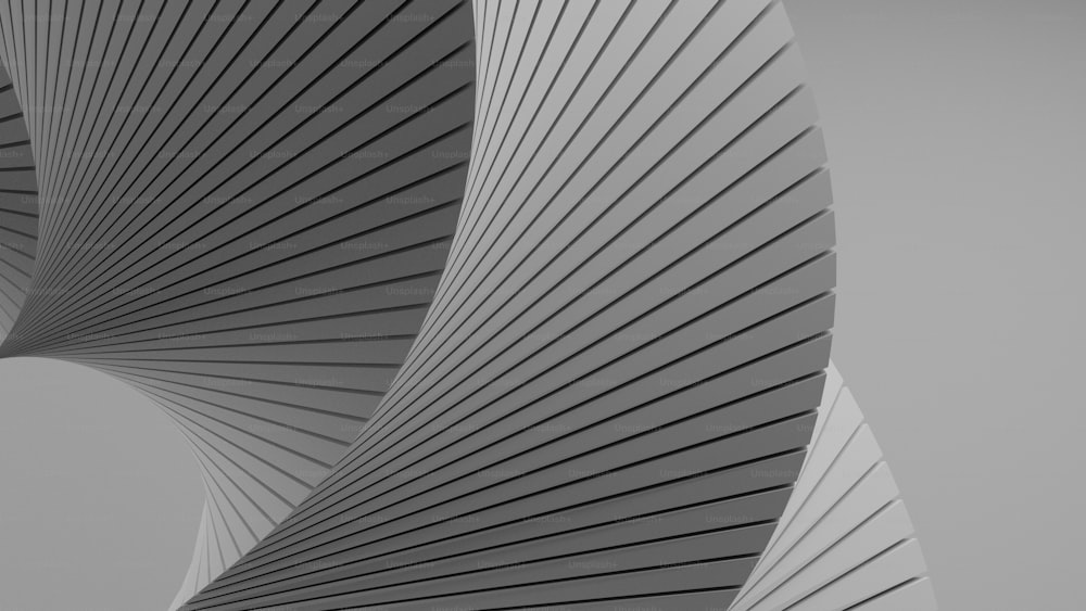 a black and white photo of a curved structure