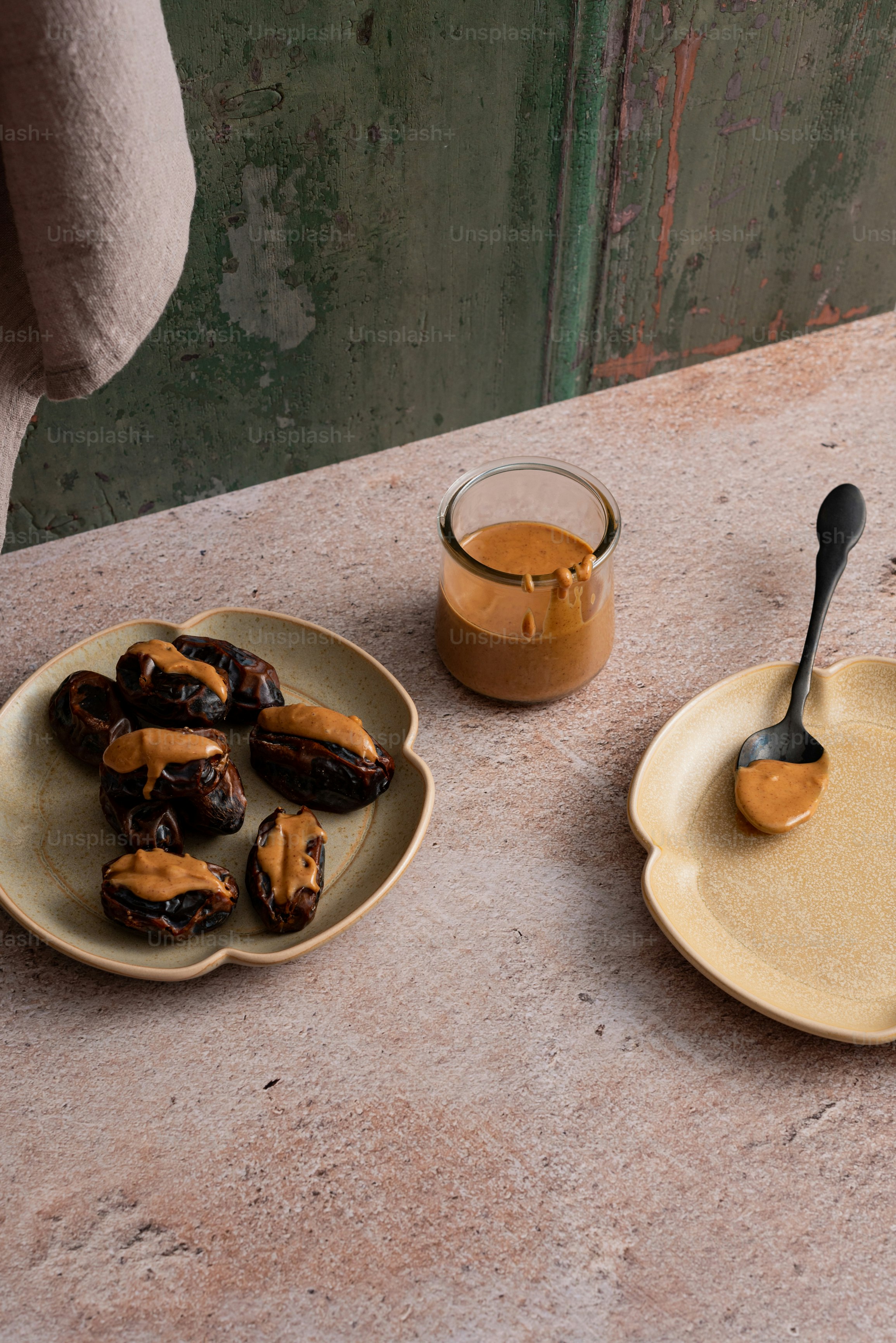 a table topped with two plates of food