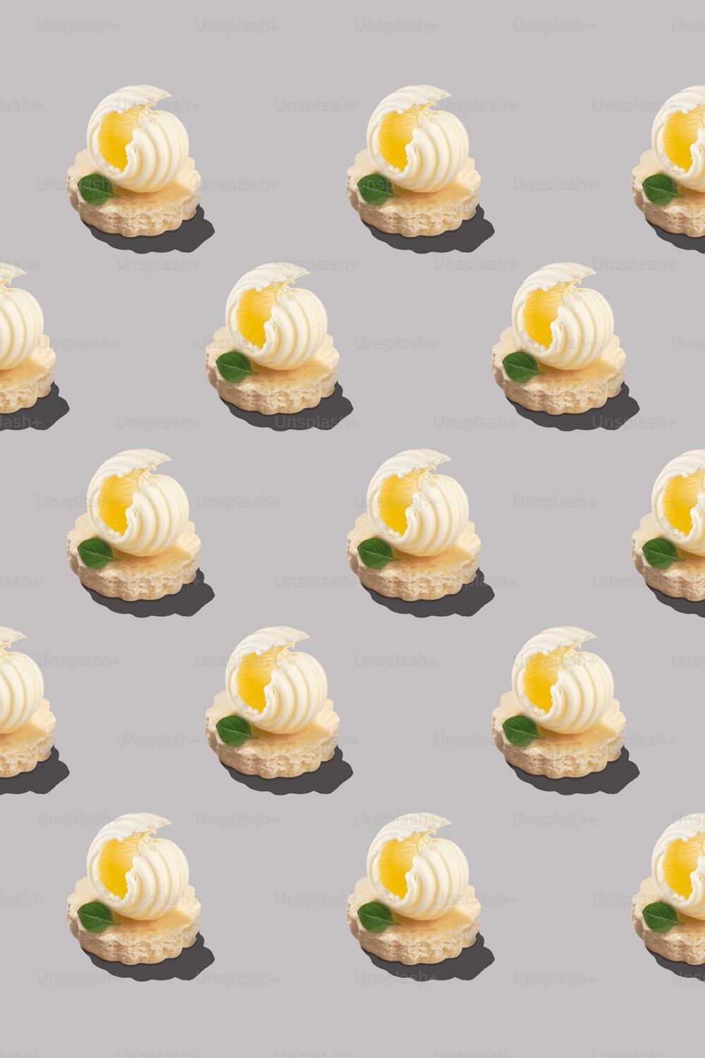 a bunch of small pastries sitting on top of each other