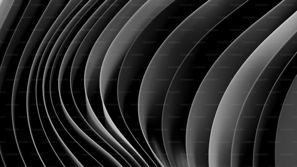 a black and white abstract background with wavy lines