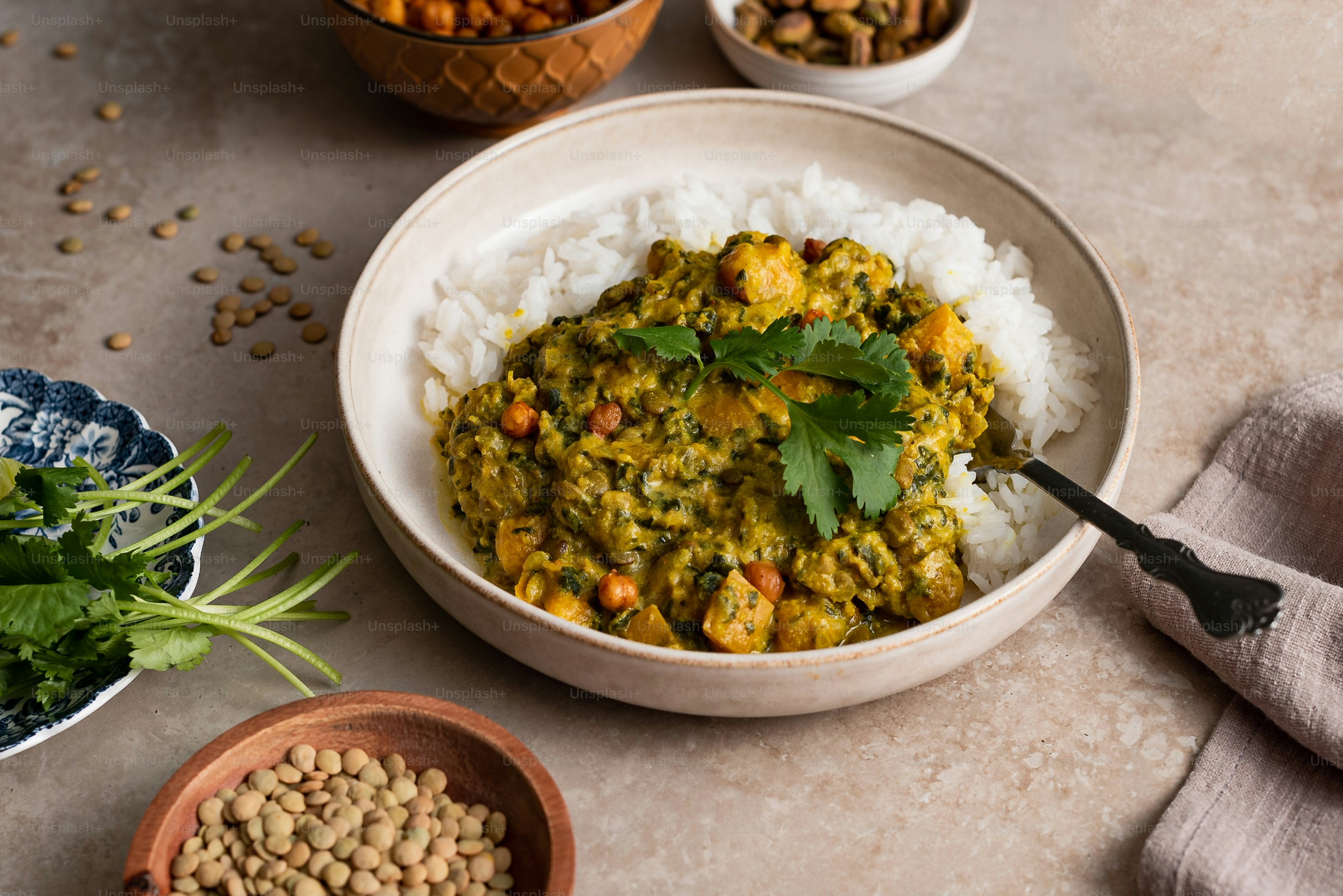 A bowl of food with rice, beans, and cilantro photo – Food styling ...