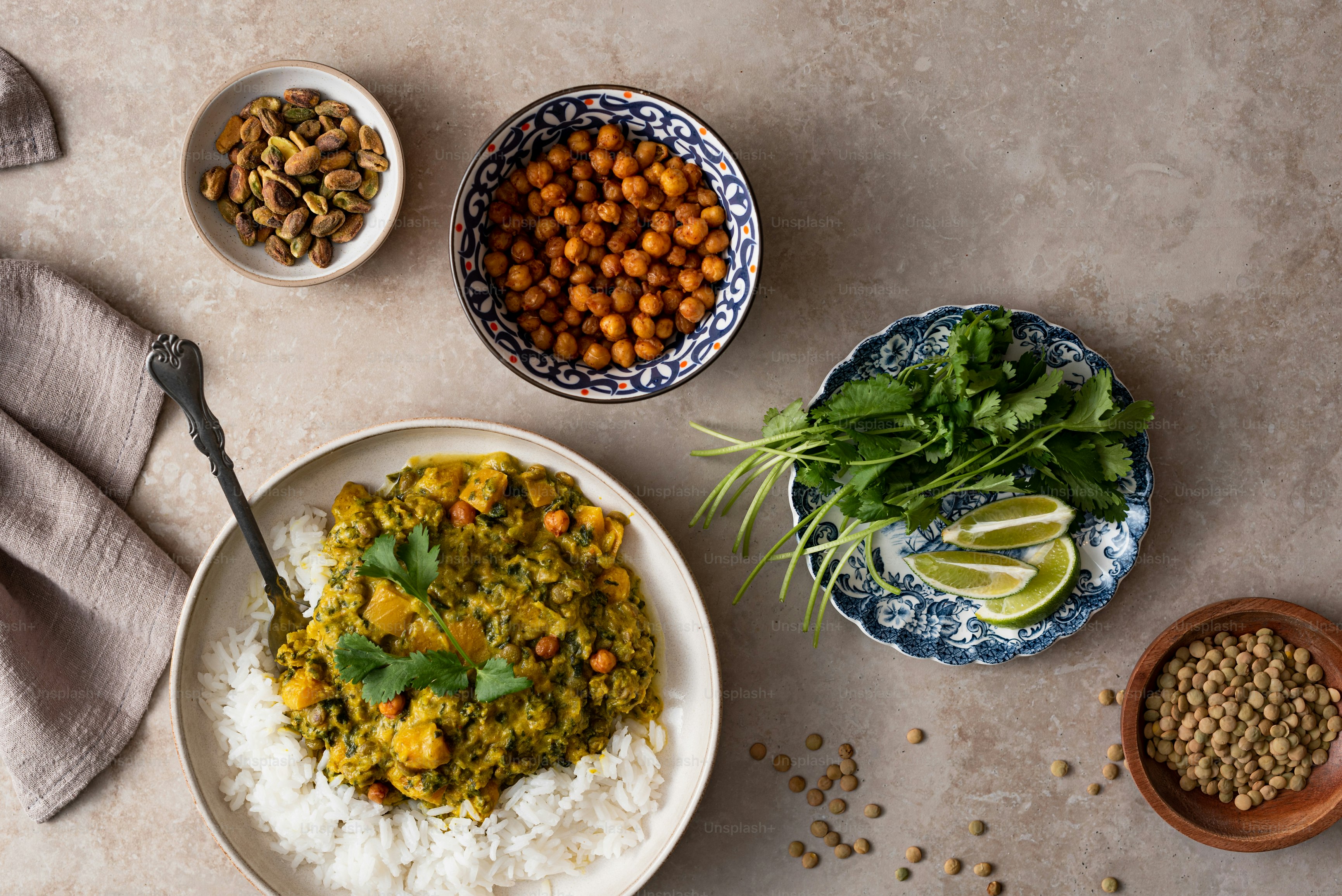 A plate of food with rice, beans and greens photo – Chickpeas Image on ...
