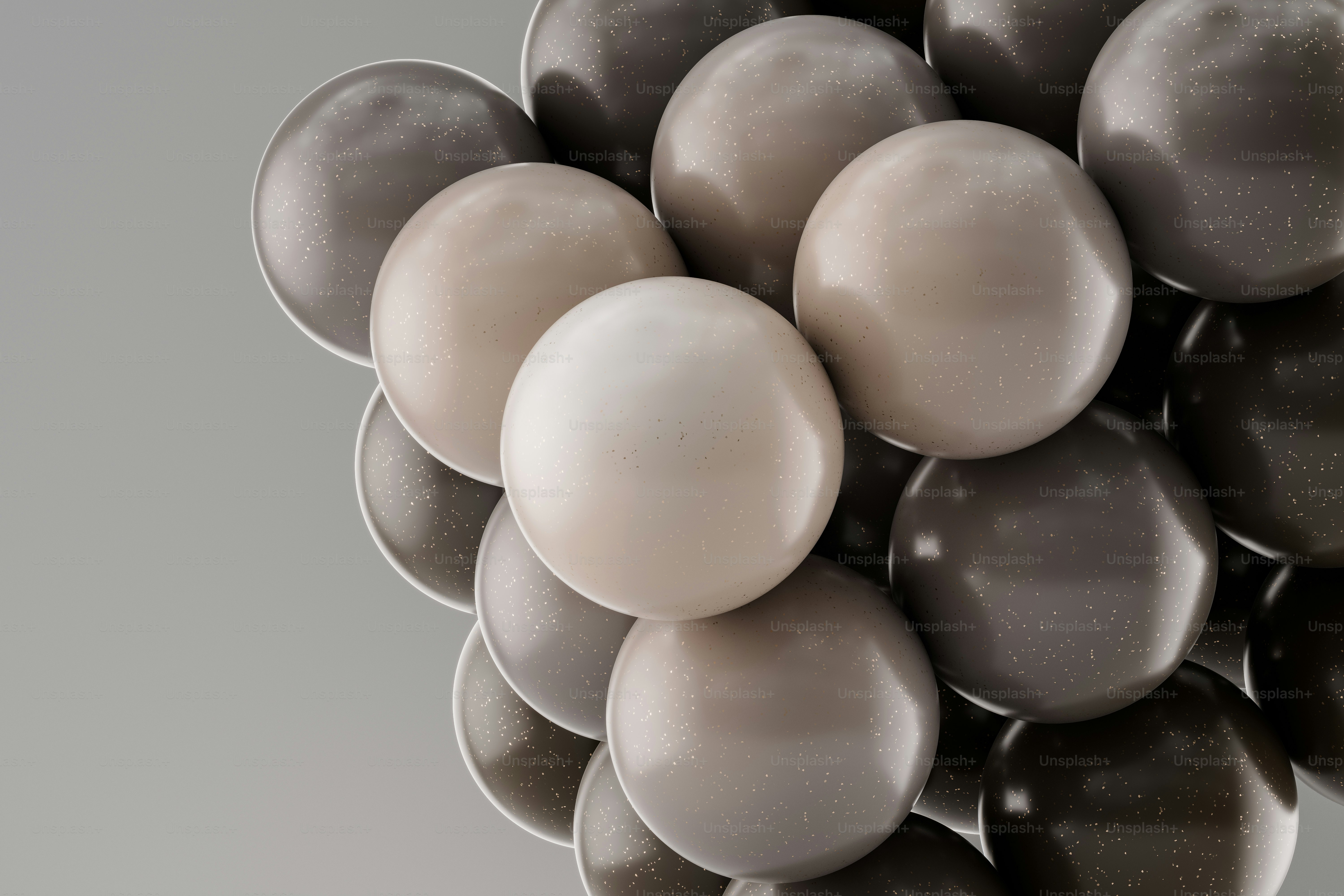 a bunch of balloons floating in the air