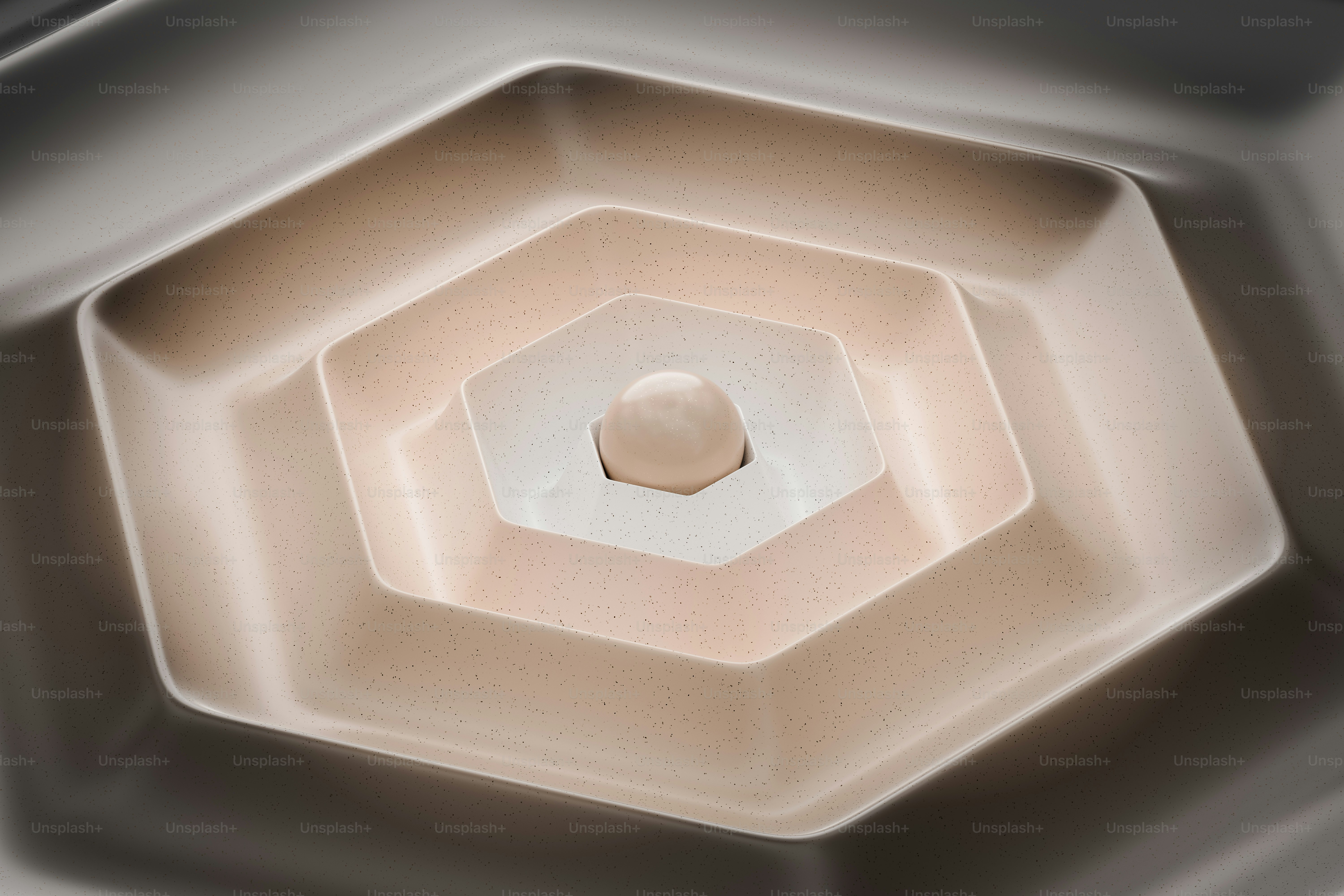 a close up of a ceiling light with a hexagonal design