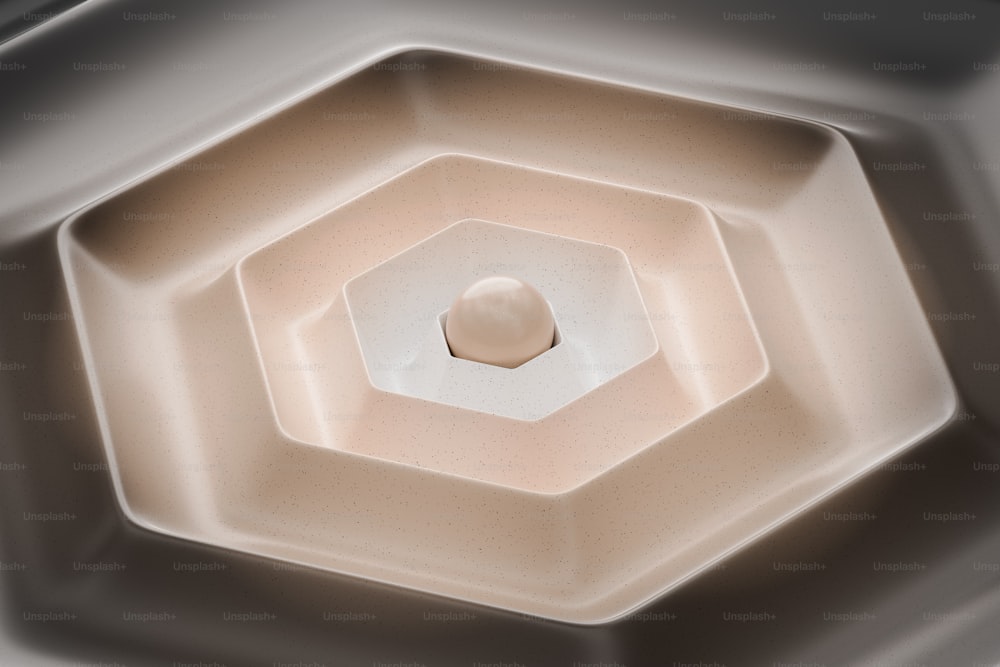 um close up de uma luz de teto com um design hexagonal