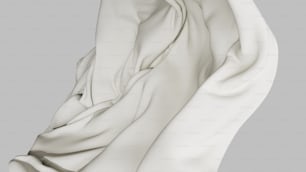 a close up of a white cloth on a gray background