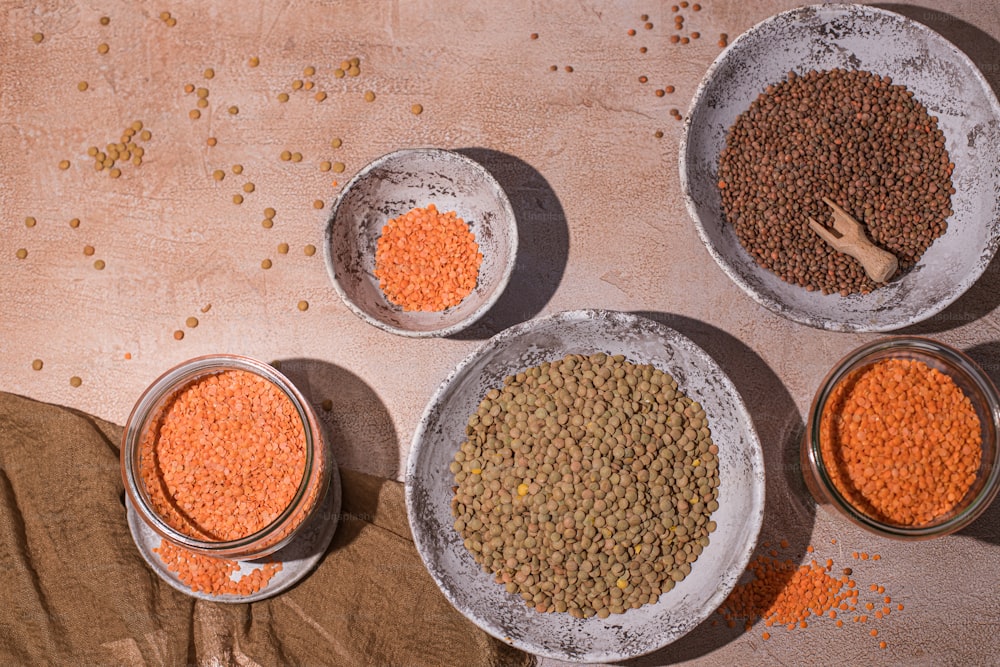 a group of bowls filled with different types of food