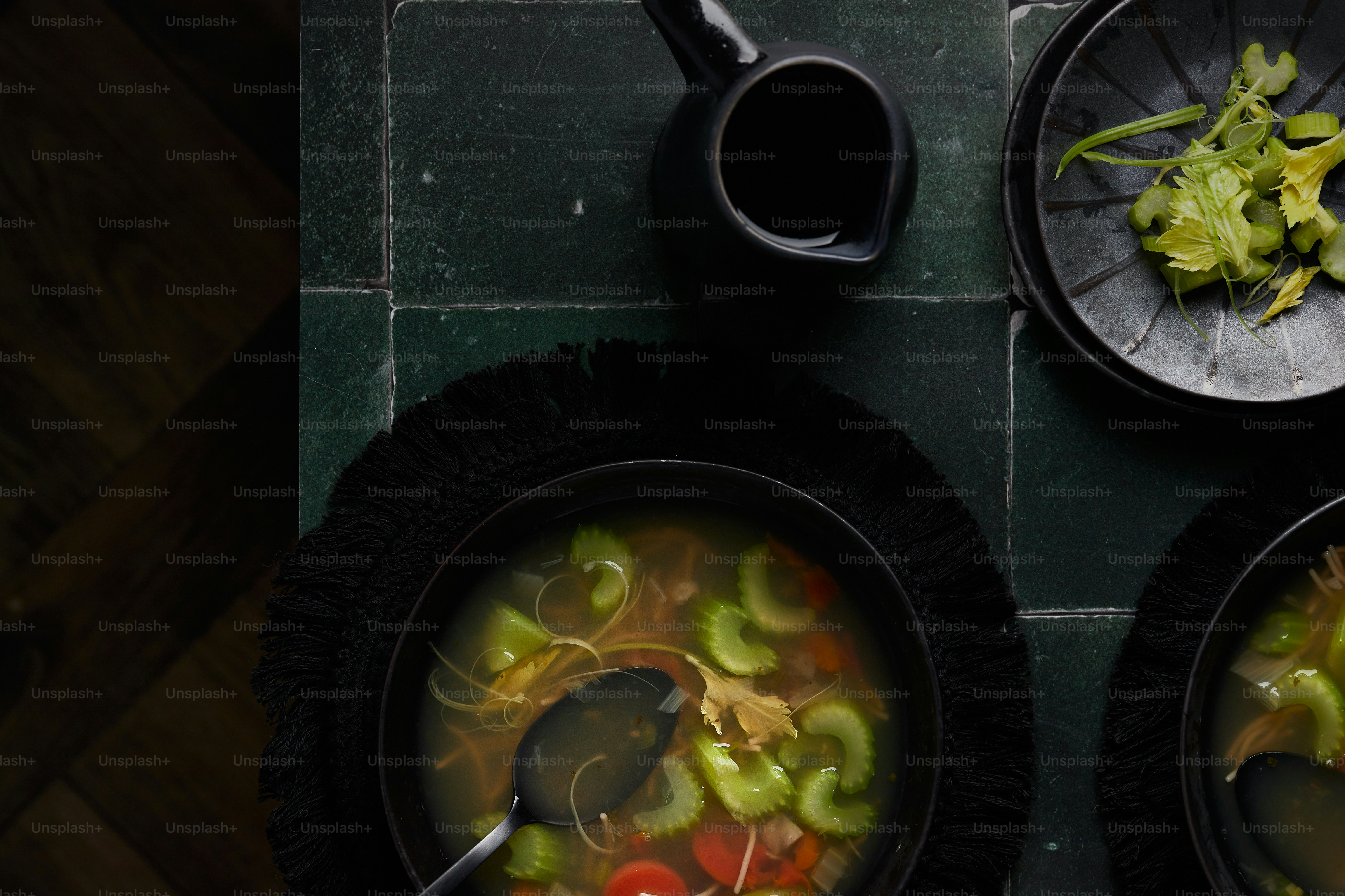 Overhead of soup in a bowl on a surface