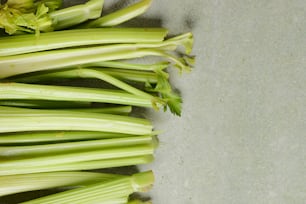 a bunch of celery sitting on top of a table