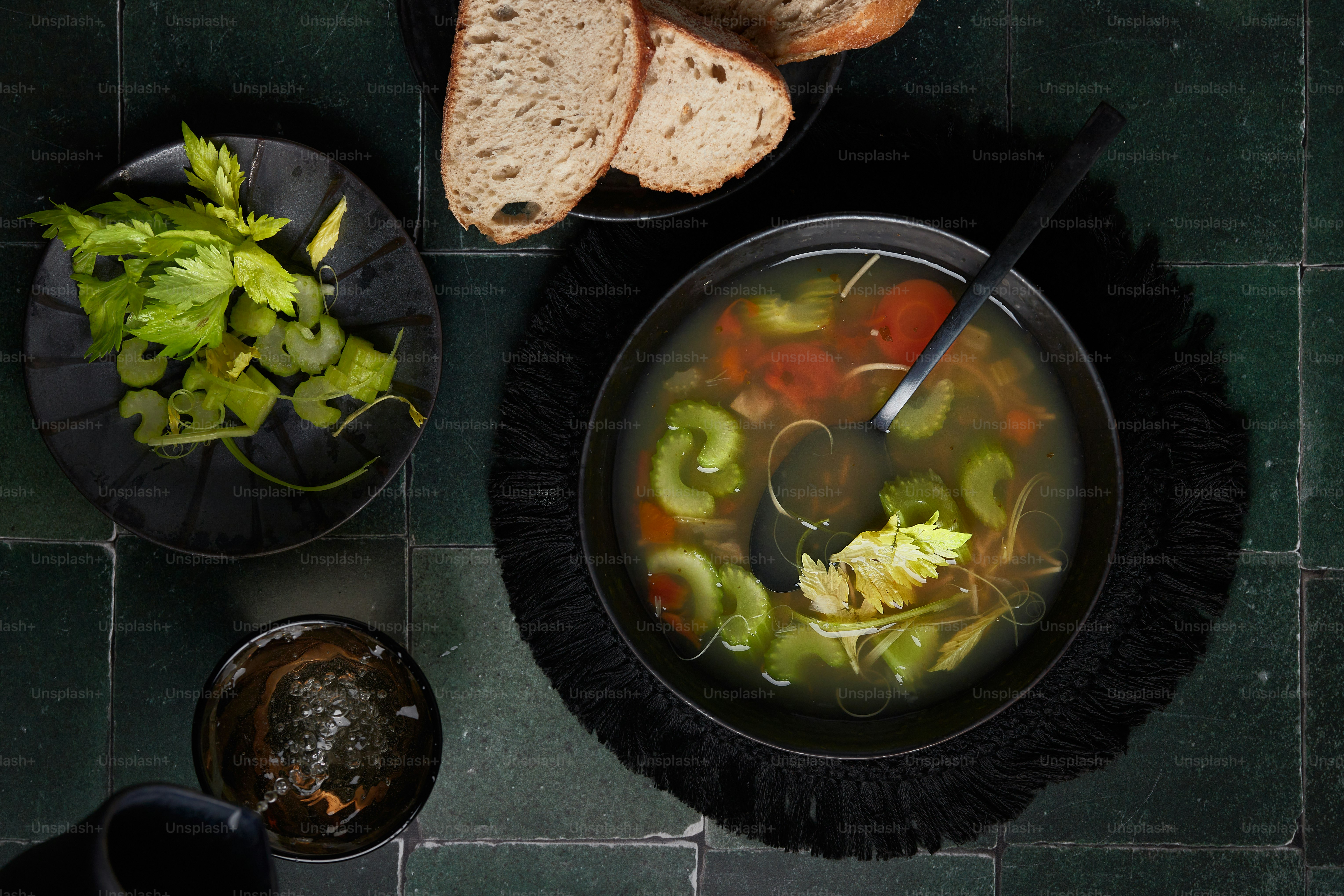 a bowl of soup with a spoon in it