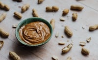A bowl of peanut butter next to a mixer photo – Drink Image on Unsplash