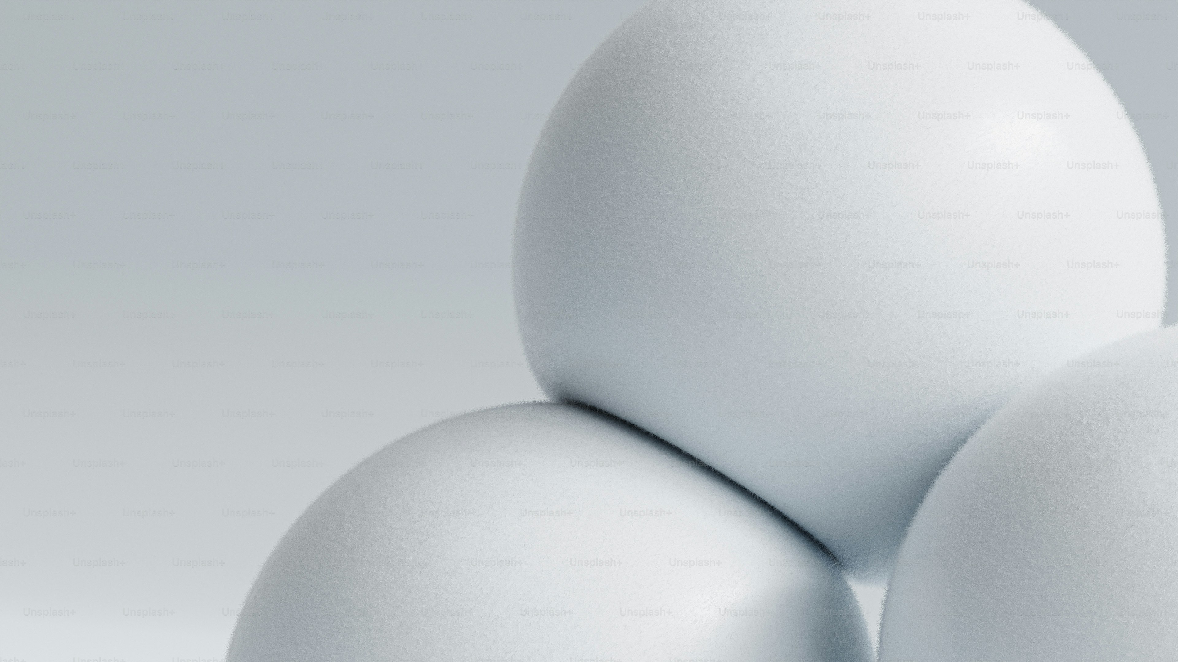 a group of white eggs stacked on top of each other