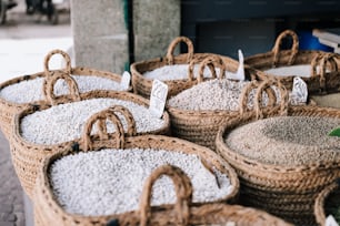 baskets filled with rice sitting next to each other
