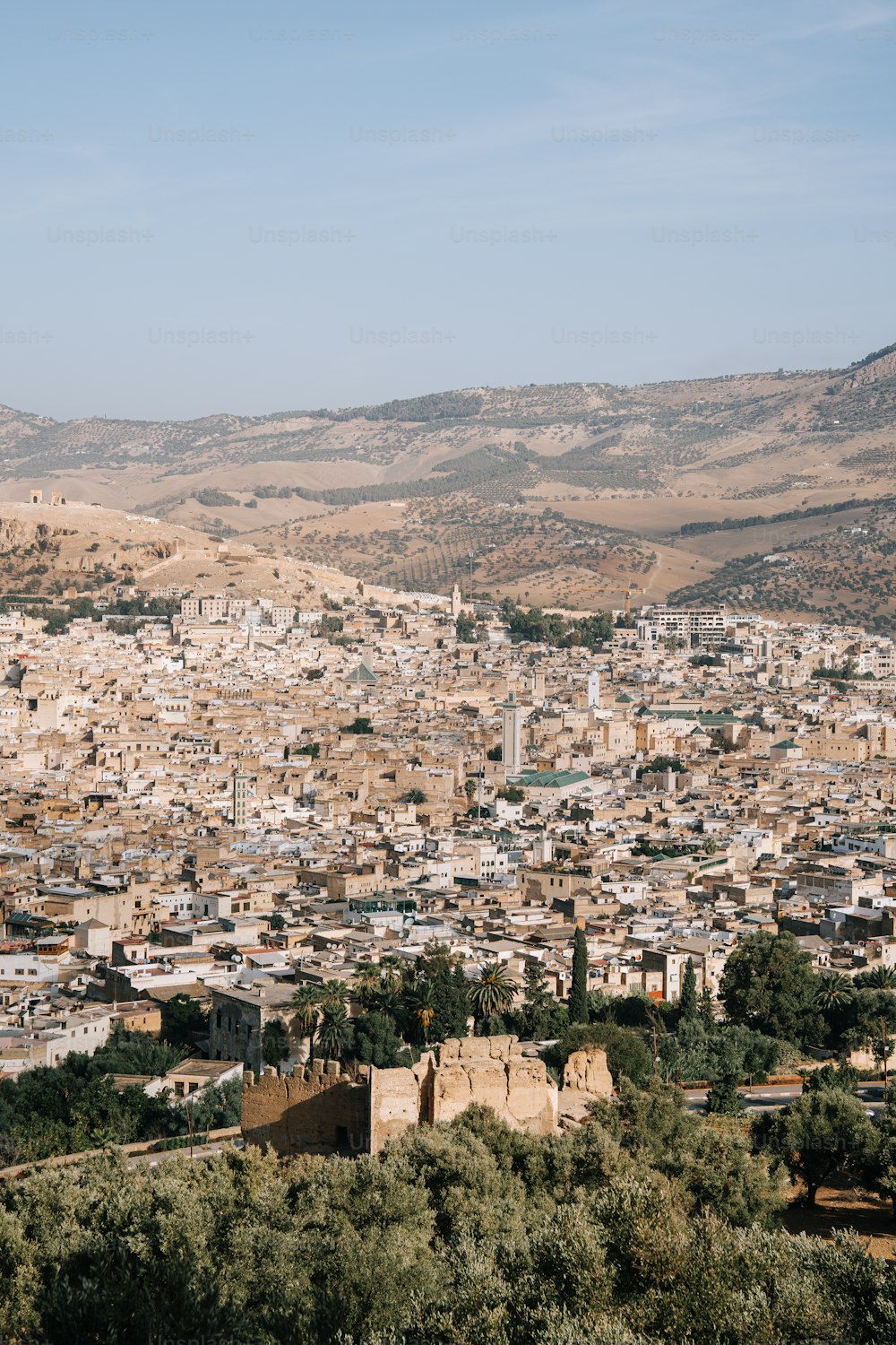 a view of a city from a hill