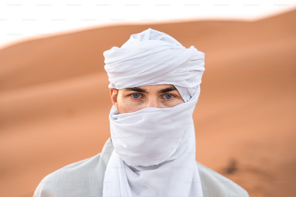 a man with a white turban on his head