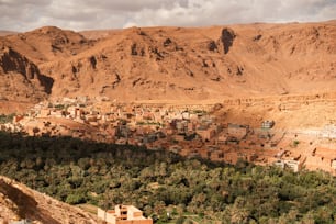 a village in the middle of a mountain range