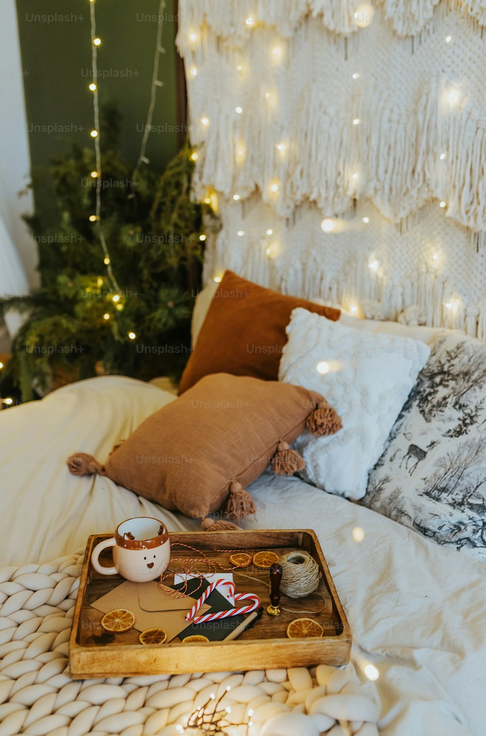 Premium Photo  Cozy bed with christmas pillows decorated with christmas  decor