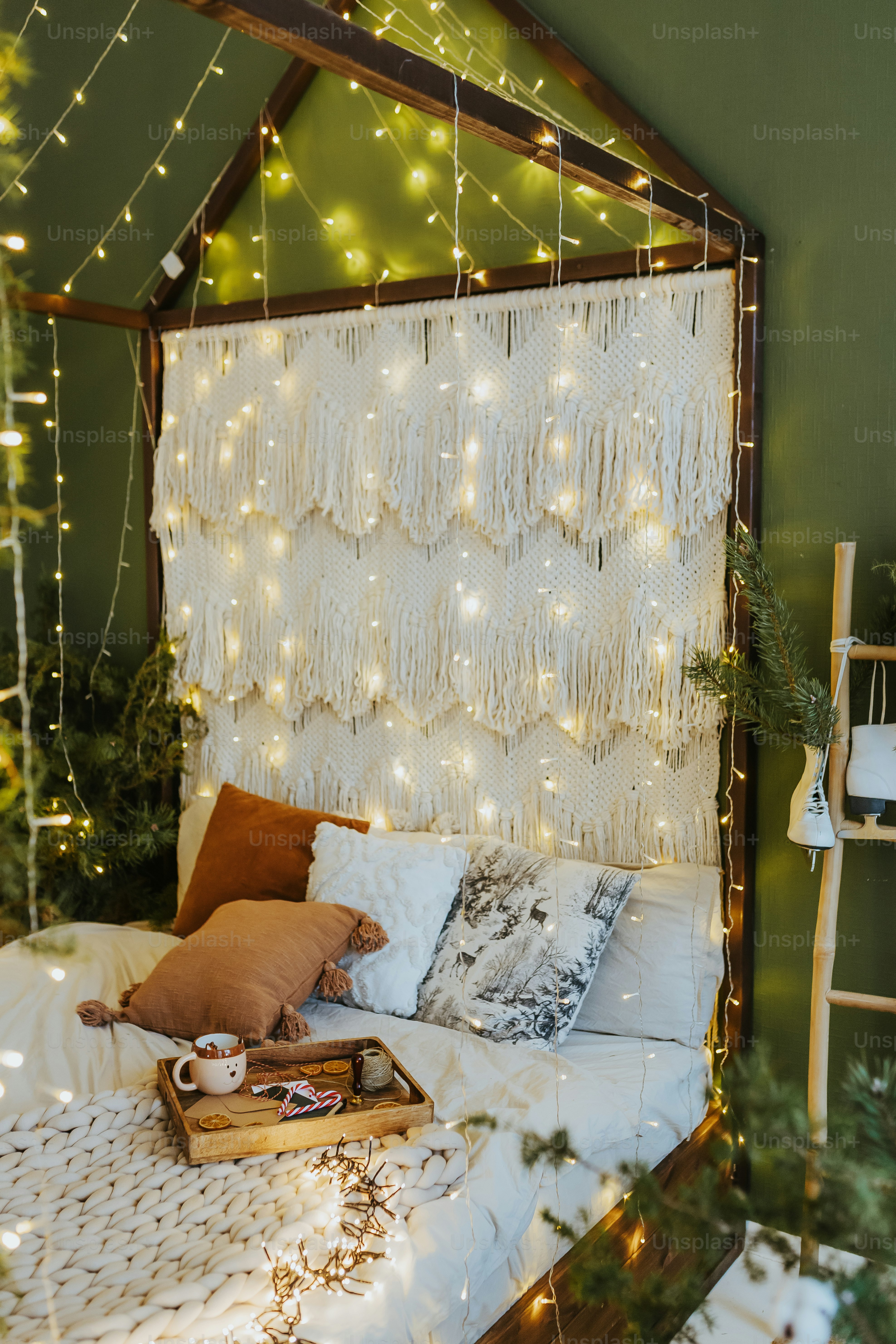 a bed with a tray of food on top of it
