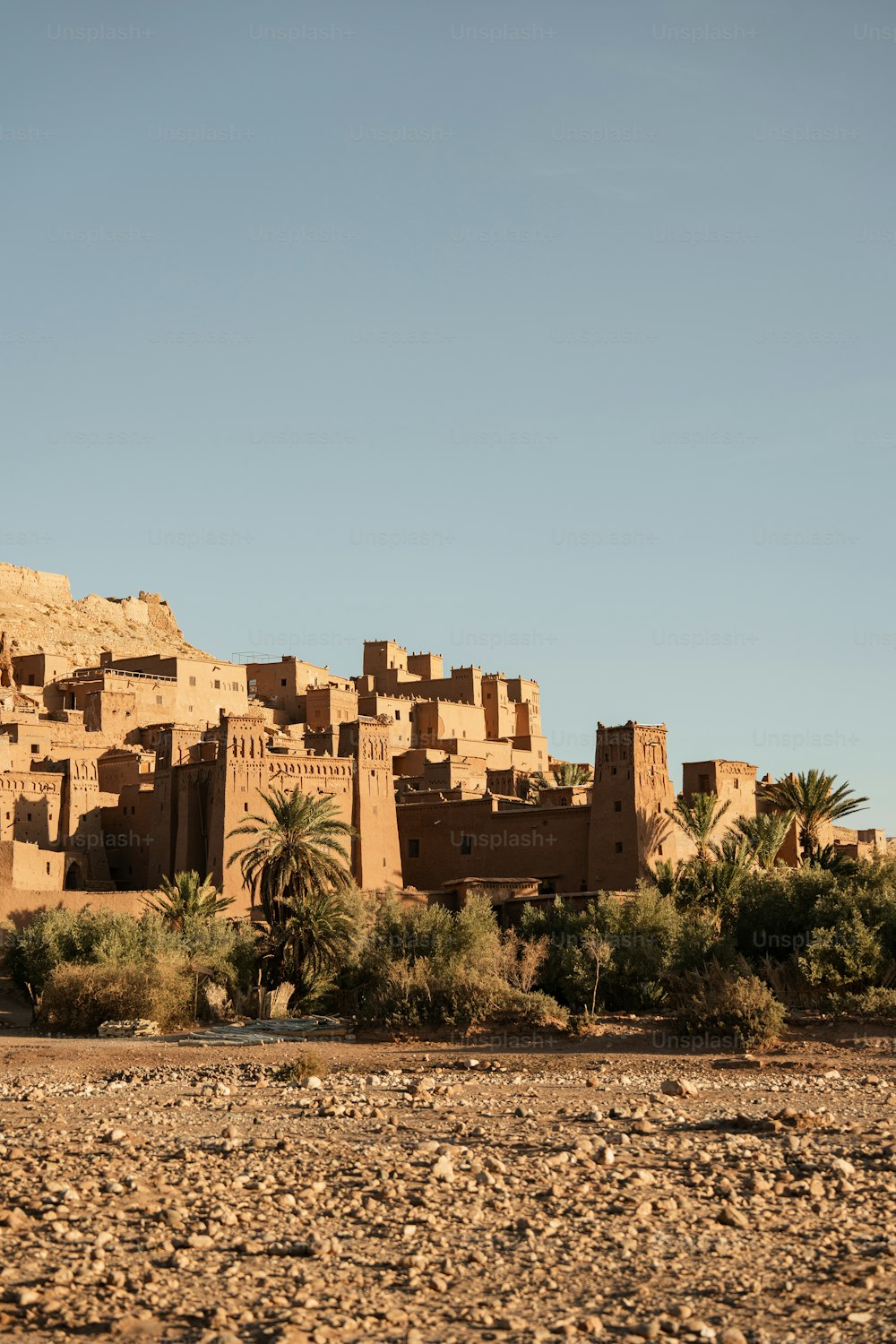 a large brown building sitting on top of a desert