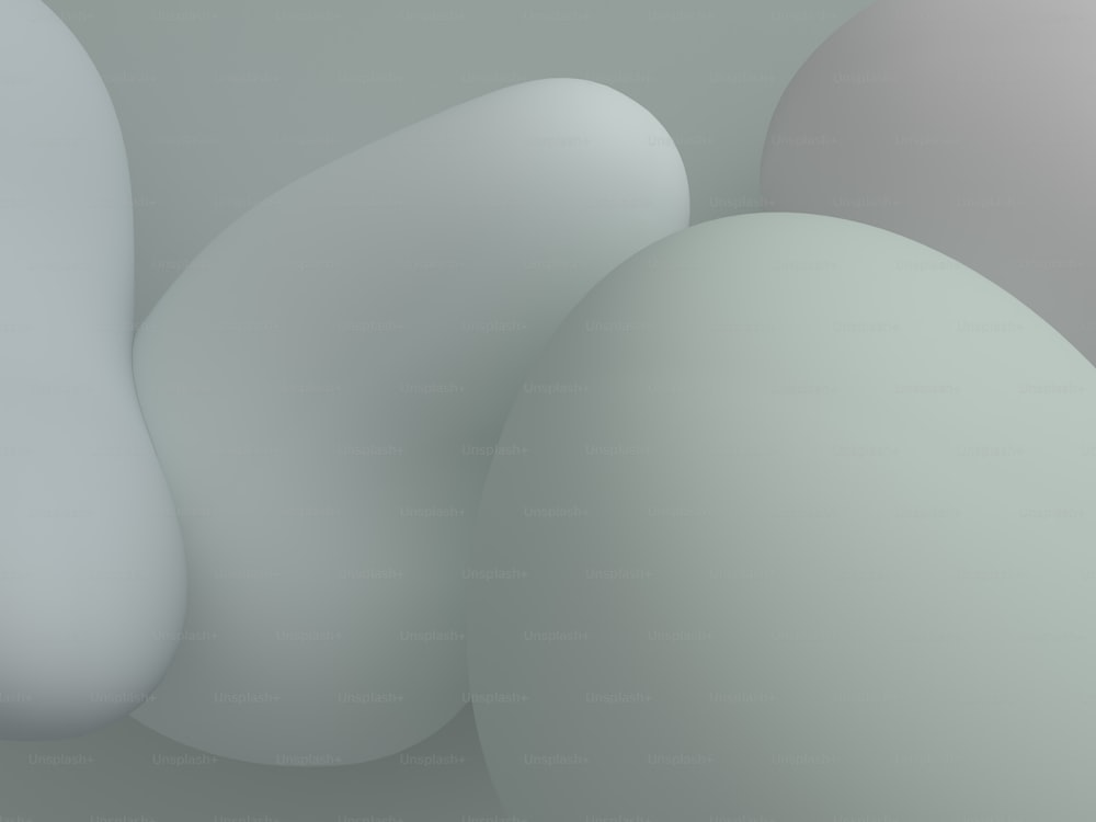 a group of white and gray balls sitting next to each other