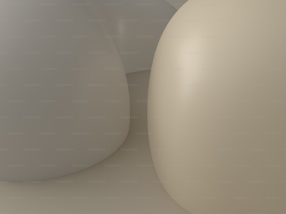 une grosse boule blanche posée sur un sol blanc