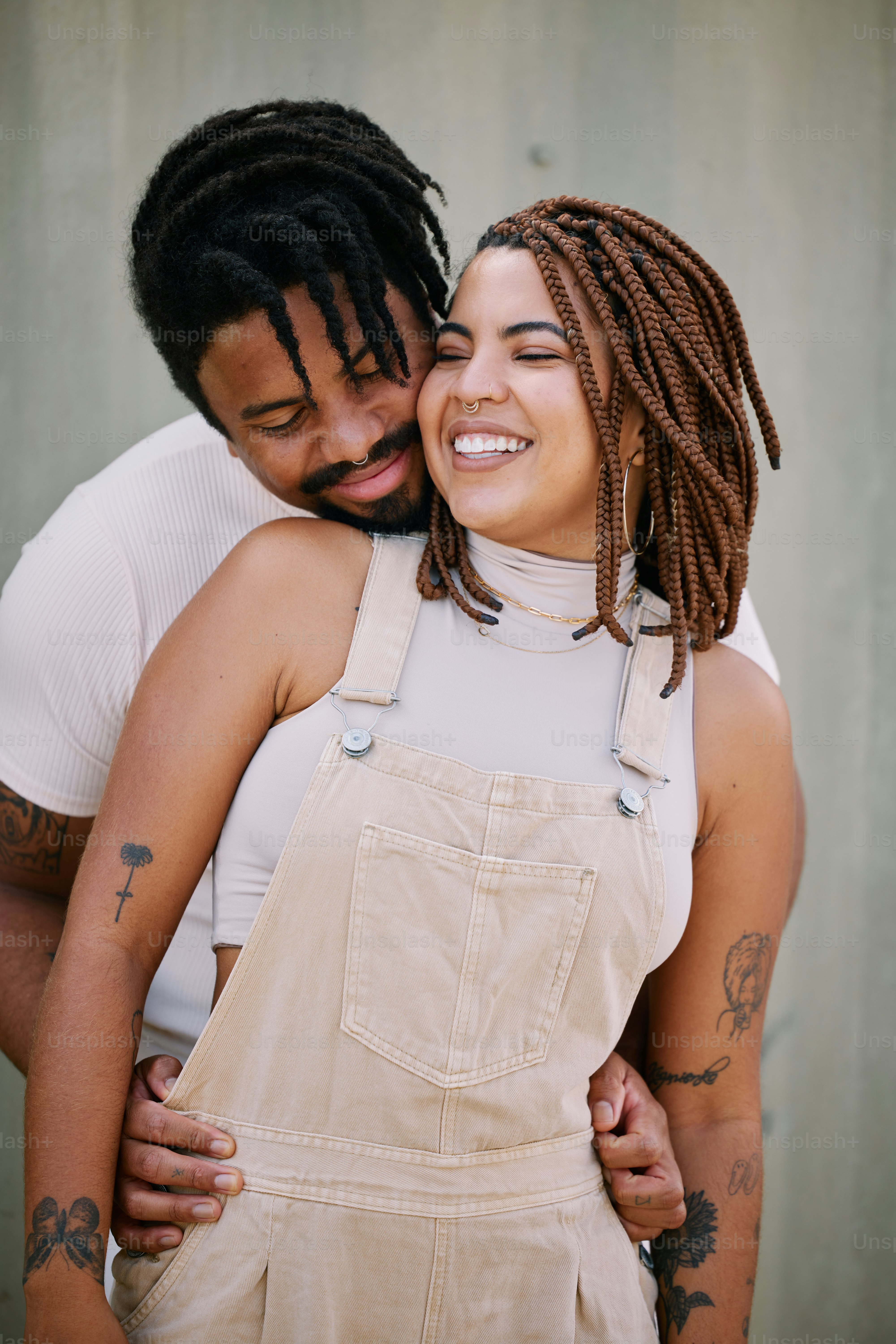 a man and a woman hugging each other