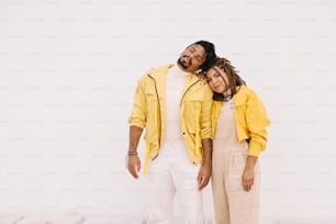 a man and a woman standing next to each other