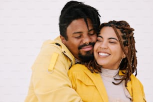 a man and a woman hugging each other